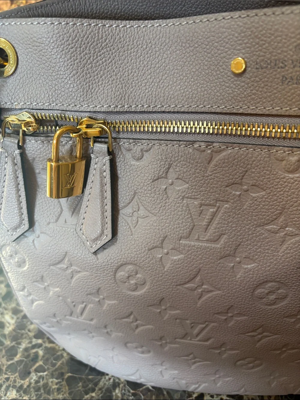 Louis Vuitton Taupe Empreinte Spontini Shoulder Bag with Gold Hardware.